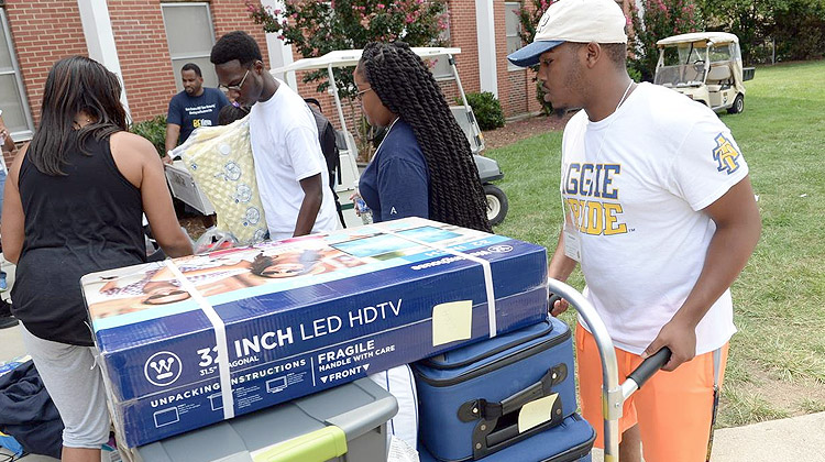 New residents use their dorm checklist for Freshman move-in day at North Carolina A&T State University.