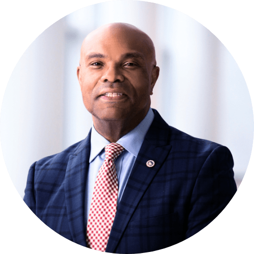 Grady Crosby, Vice President and Chief Sustainability and Impact Officer at Northwestern Mutual, smiling in a professional headshot.