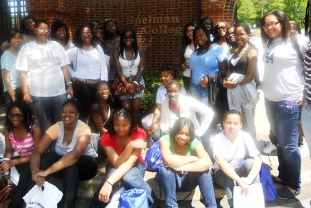 HBCU College Tours: A group of female high schools students pose in front of Spelman College.