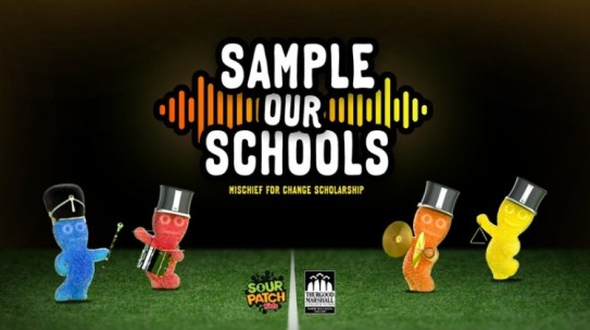 In honor of the Sample Our Schools Mischief for Change scholarship, an artist made a picture of colorful Sour Patch Kids candies dressed as marching band members playing instruments on a field.