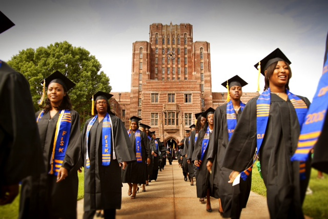 Pictured are graduates march out of the Cravath Hall building at Fisk University, a private HBCU in Nashville, TN. Fisk is one of the 107 schools on the HBCU colleges list from around the nation.