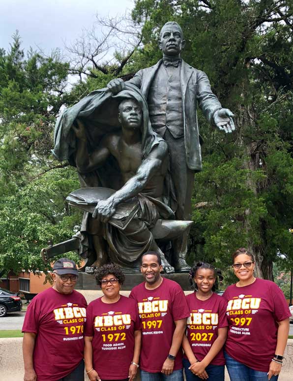 Gibson Family under the Booker T. Washington Lifting the Veil of Ignorance statue at Tuskegee University.