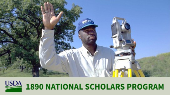 A USDA Natural Resources Conservation Service (NRCS) employee working on a project supporting farm land owners.