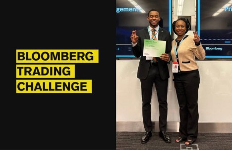 Jaeden Patterson and Dr. Daniels-Hollar celebrating the Bloomberg Trading Challenge win at Bloomberg headquarters.