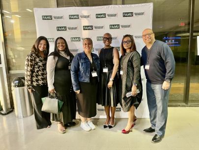 Jessica Watson poses with team members and Florida A&M University faculty during Homecoming, where Fidelity Investments hosted student events on campus.